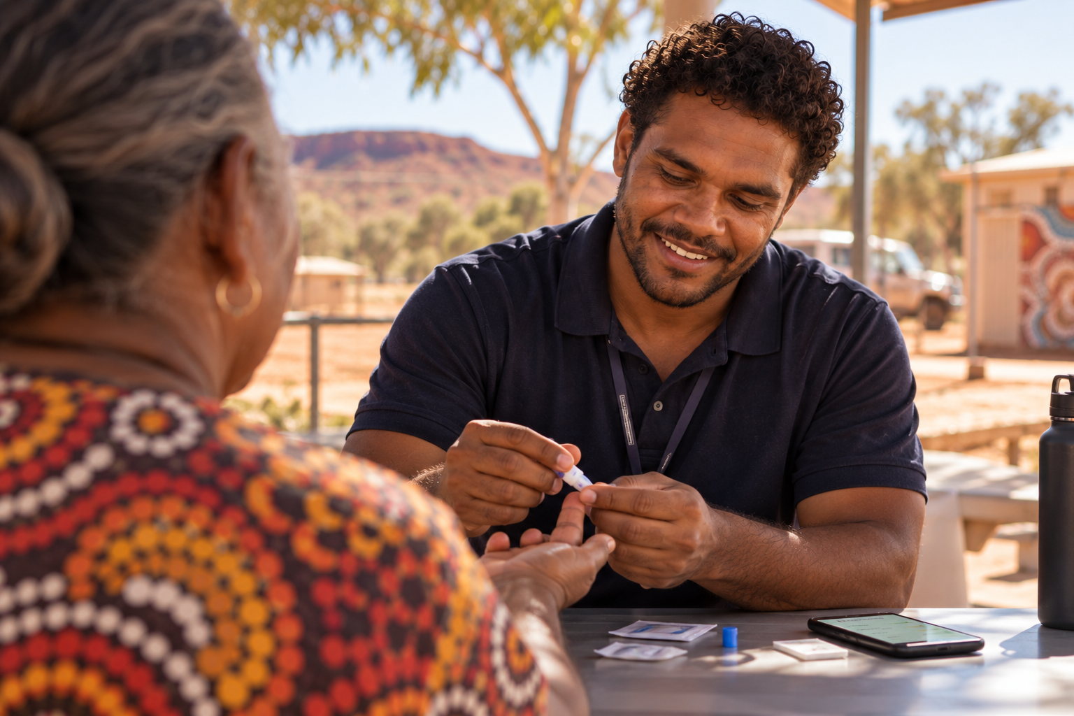 Peter helping someone complete a community screening test